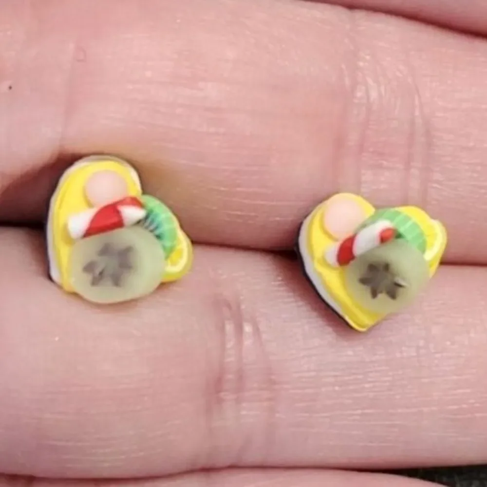 Silver tone heart-shaped dessert earrings